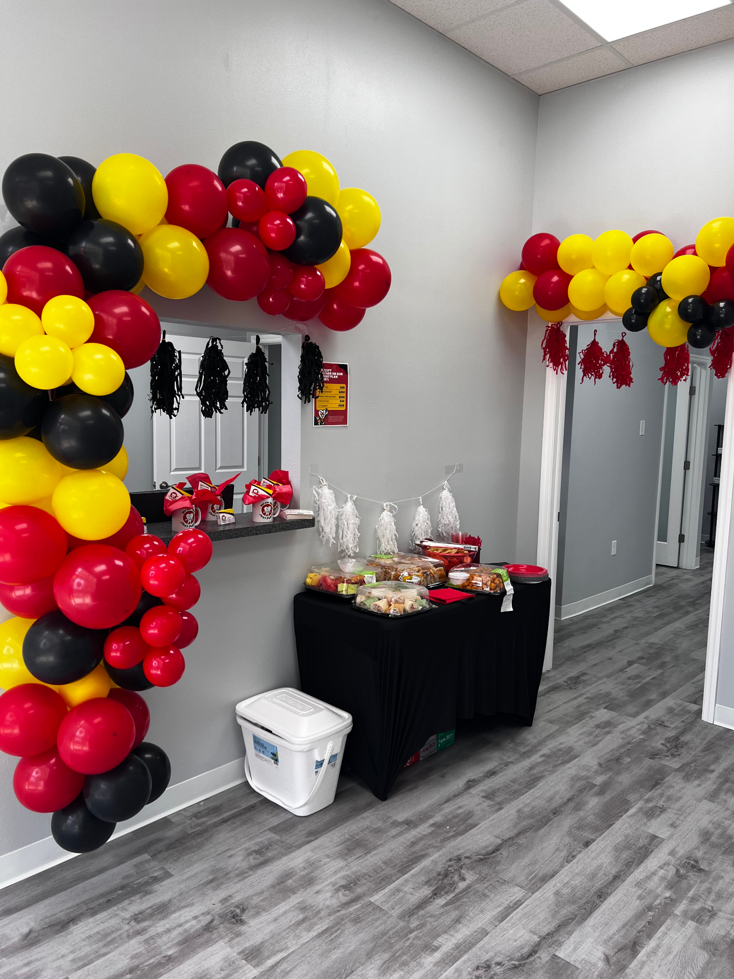 Balloon decor and refreshment table inside the Brandon office