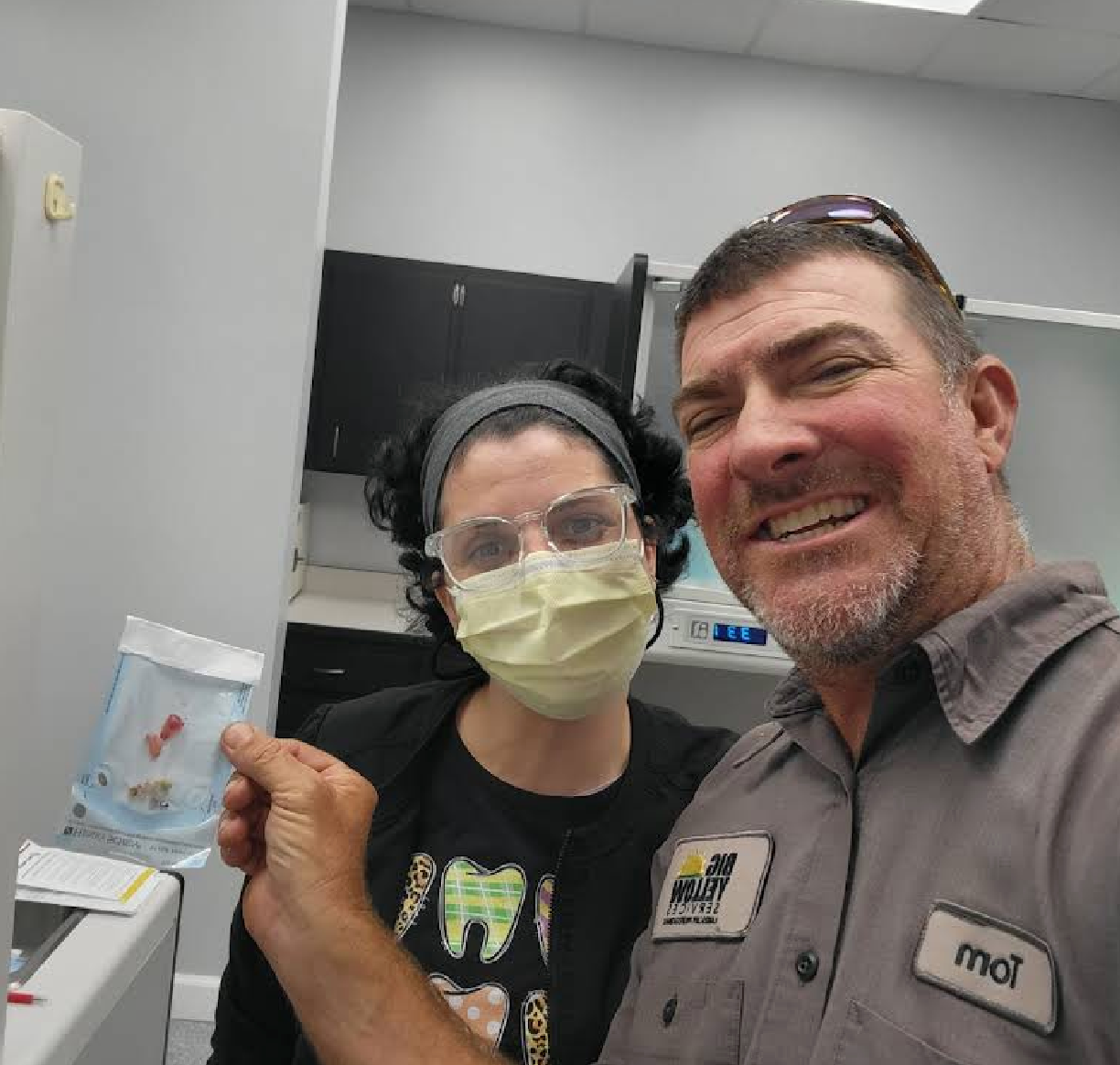 Happy patient after a same-day extraction in Zephyrhills