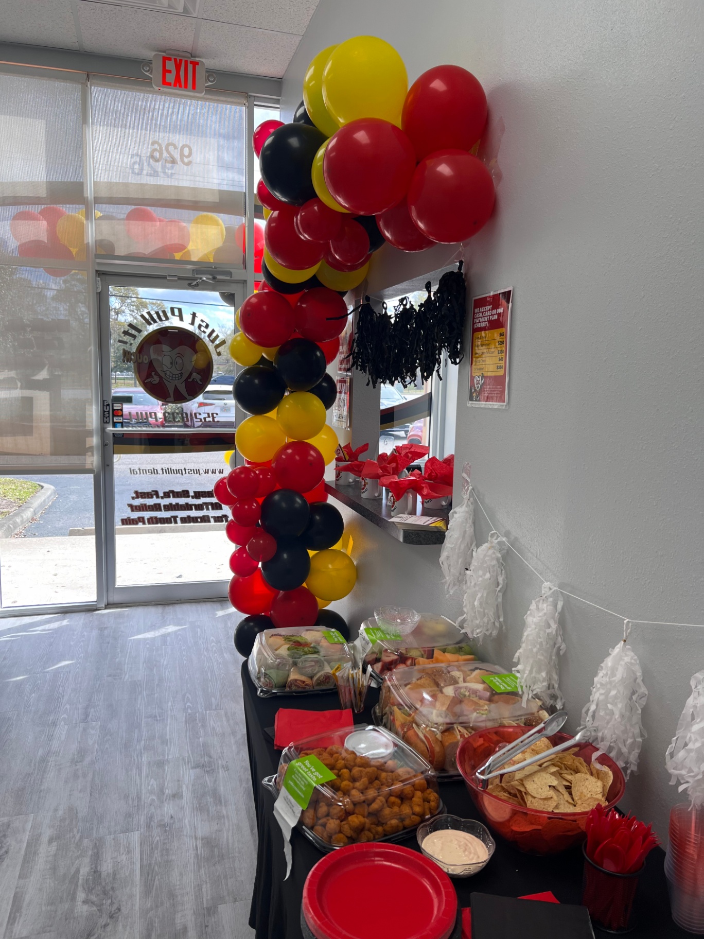 Grand opening refreshments and balloons at the Brandon office entrance