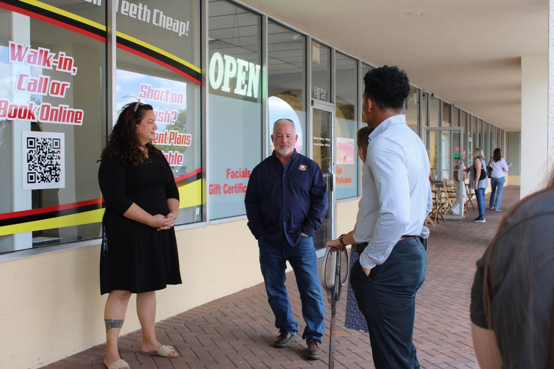 City of Pinellas Park chamber representative chatting with the team