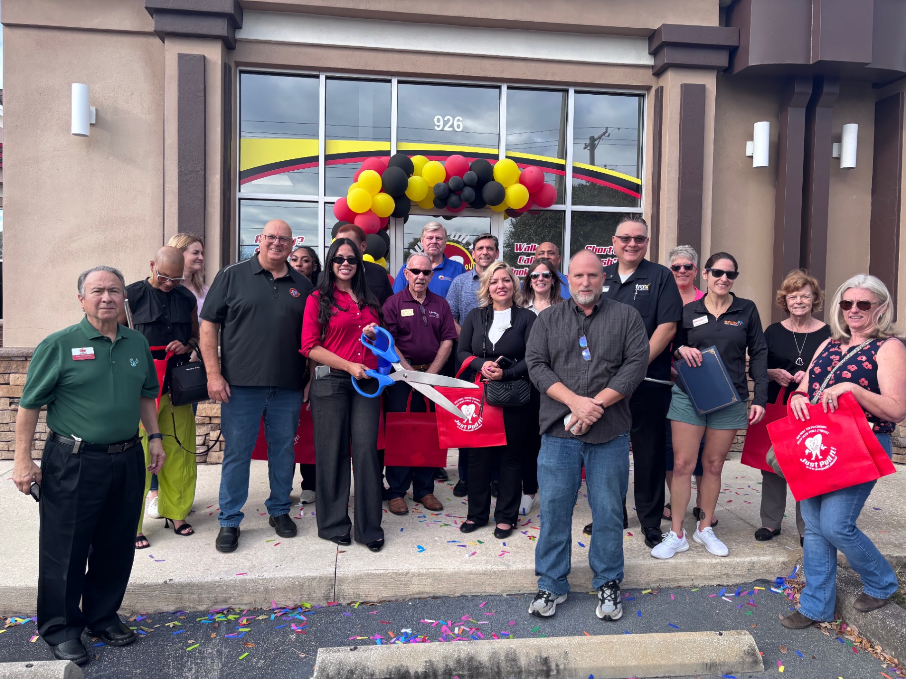 Ribbon cutting ceremony outside the Brandon office